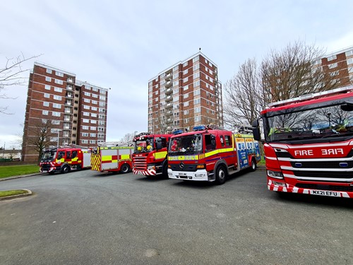 Fire engines from north west fire and rescue services parked at Gaywood Green tower blocks in Kirkby
