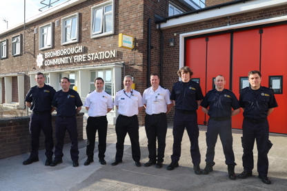 Chief Fire Officer Phil Garrigan with senior officers and Bromborough firefighters